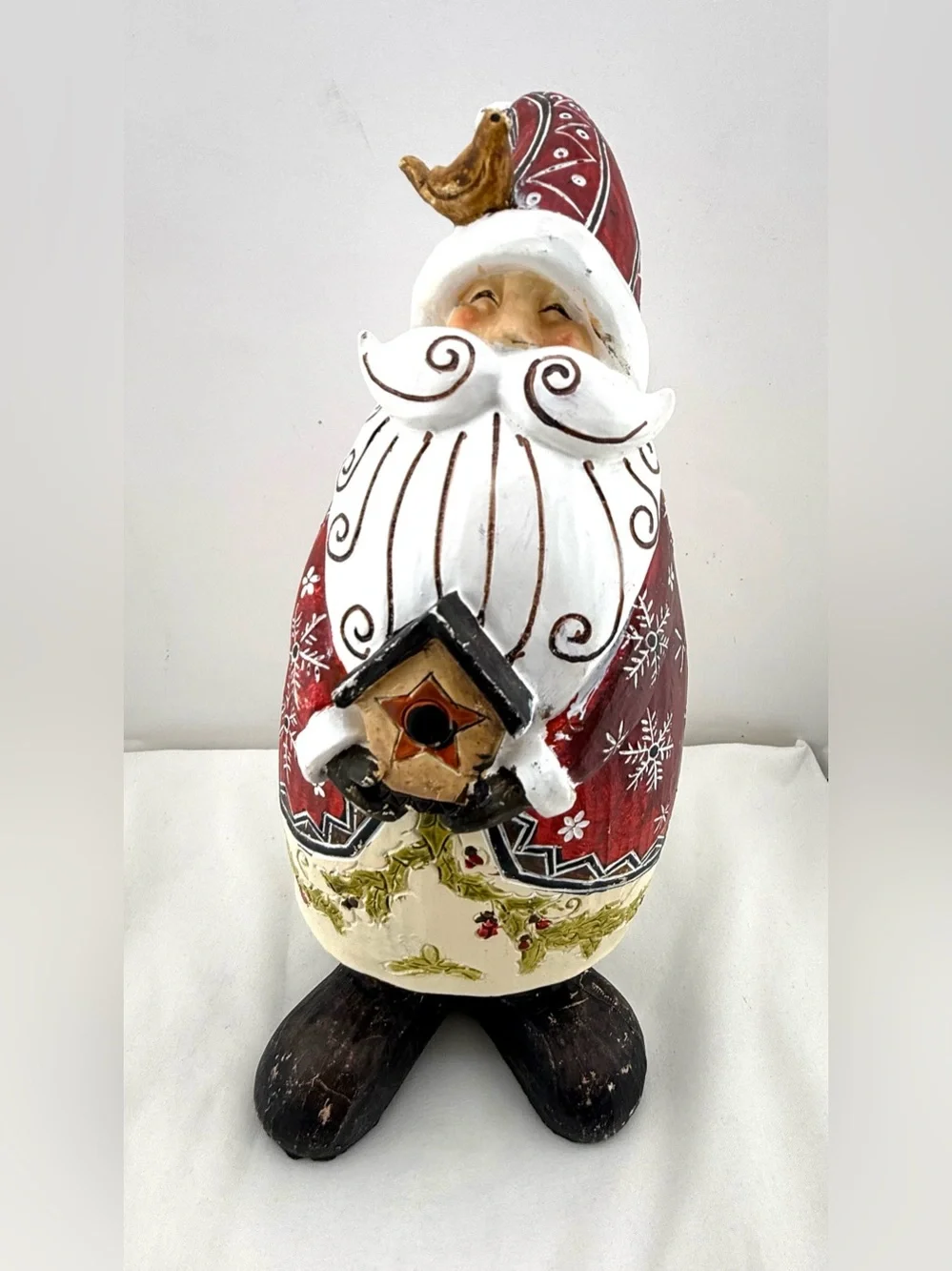 Folk art style resin Santa Claus figurine